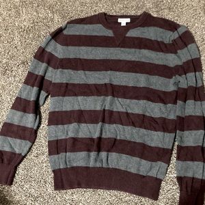Slightly worn striped sweater